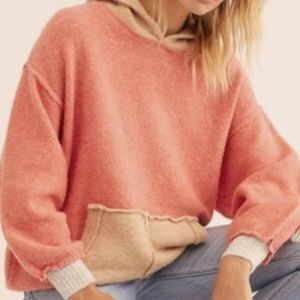 Gorgeous coral orange free people sweater with pocket and hood NWT size XS